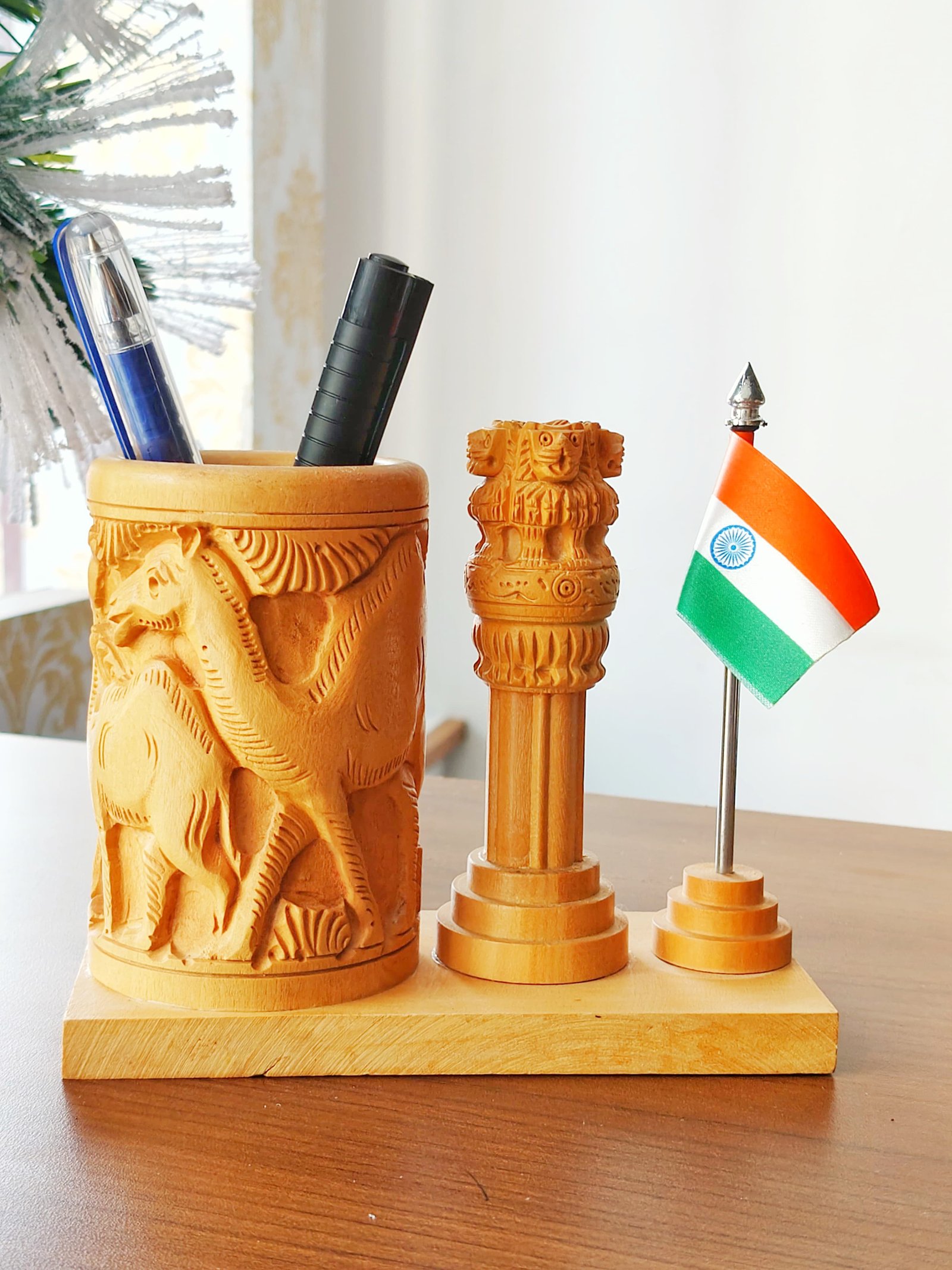 Ashoka Pillar Tabletop Pen Holder crafted in white wood with camel carving thumbnail 1